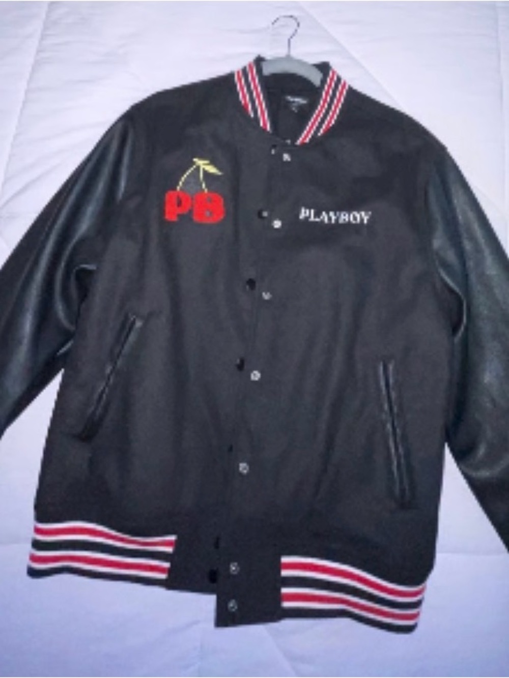 PLAYBOY Black Varsity Jacket with Red & White Stripe Accents